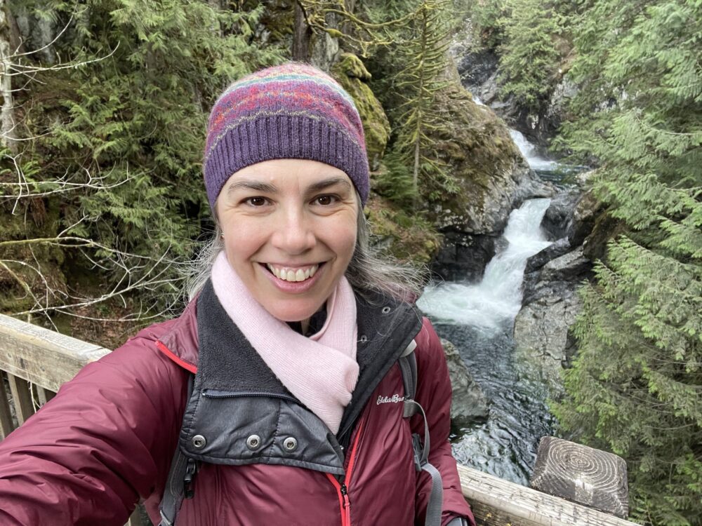 Emily celebrating nature on a birthday hike (2022).
